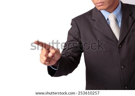 Businessman pointing to other way
