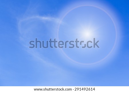 Sun Halo or Rainbow ring on  blue sky and cloud