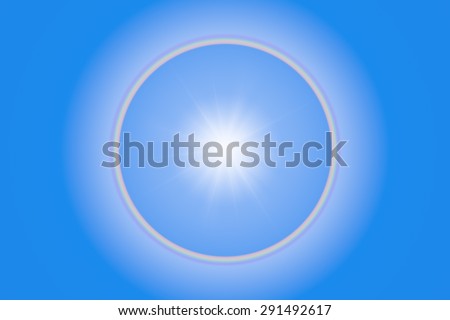 Sun Halo or Rainbow ring on  blue sky