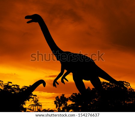 the silhouettes of dinosaurs