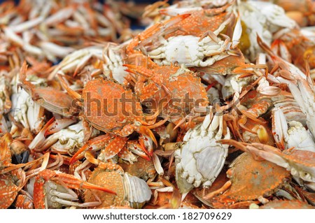 Boiled crabs in the blue dish