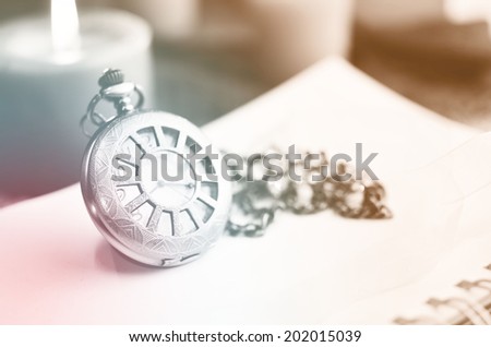 Antique pocket clock made with color filters