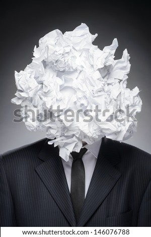 Paper head. Portrait of business person with his head covered with paper