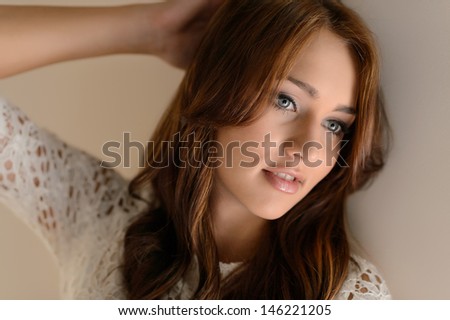 WomenÃ?Â¯Ã?Â¿Ã?Â½ beauty. Portrait of beautiful young women posing with her hand in hair