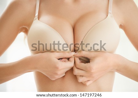 Wearing bra. Close-up of women wearing bra