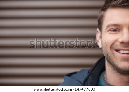 IÃ?Â¯Ã?Â¿Ã?Â½ happy. Cropped image of happy handsome men smiling at camera while standing outdoors