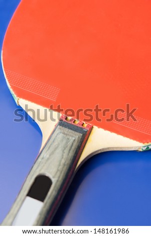 Table tennis racket. Close-up of red table tennis racket