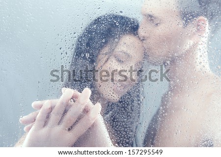 Loving Couple In Shower. Beautiful Loving Couple Hugging While Standing In Shower