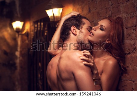 Beautiful couple having sex in gorgeous place. Man kissing womanÃ?Â¢??s neck 