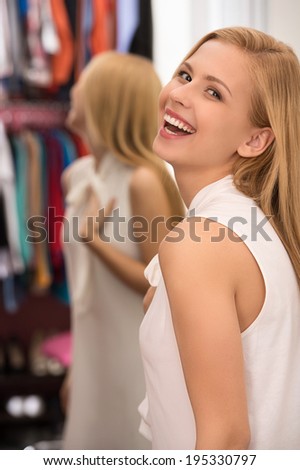 beautiful young girl smiling and laughing. attractive slim blond expressing emotions