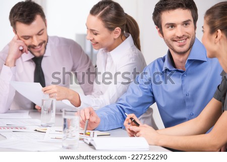 Group of young business people talking in couples. business man and woman working on meeting in office