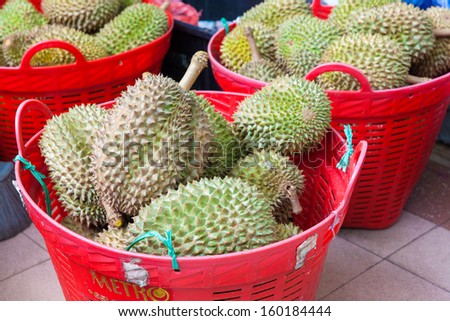 Basket with durian fruit at the street market, Singapore
