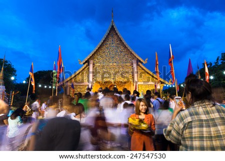 Chiang Mai, Thailand - 29 May, 2014: Crowd of people worshiping at Wat Chedi Luang during City Pillar Festival ( Inthakin Festival) on 29 May 2014, Chiang Mai, Thailand.