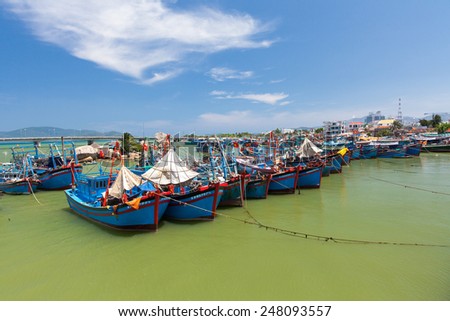 Nah Trang, Vietnam - April 14, 2014: Vietnamese fishing boats in the port near Nha Trang city on April 14, 2014, Vietnam.