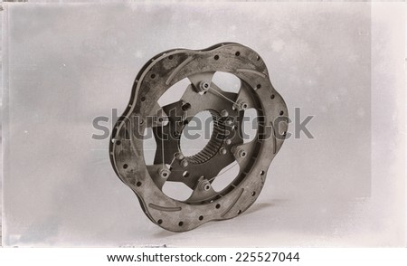 Titanium brake rotor for a sprint car that has warped and cracked. Analog filter applied.