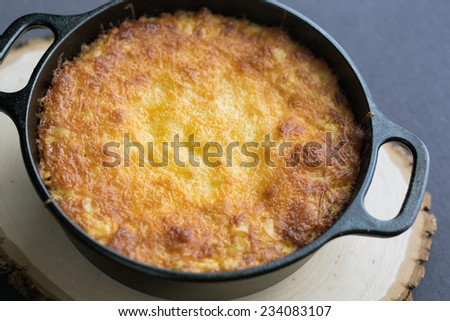 Southern style macaroni and cheese in a cast iron Dutch oven.