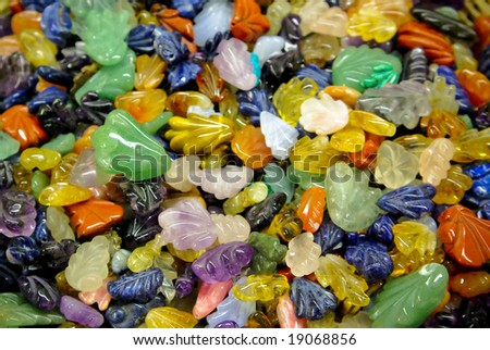natural background - pile of semi precious jewelery stones closeup. best for craftsmanship, interior design, gift