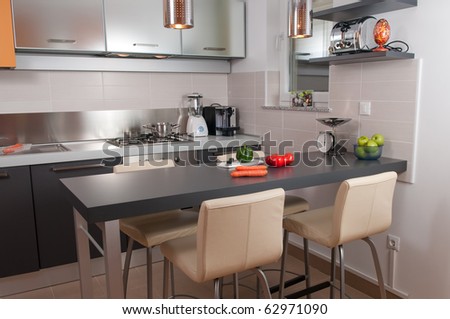 Modern kitchen with stylish appliances and cabinets