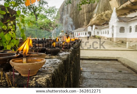 Golden Temple buddhist caves, signs of worship - Dambulla, Sri Lanka