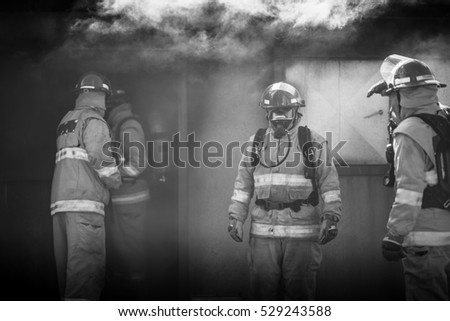 Fire Team Outside Smoking Building