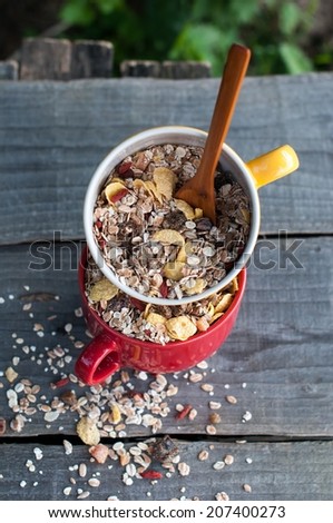 Two bowls of cereals on  wooden background