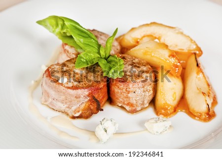 Bacon wrapped mackerel fillet with saffron sauce and potato