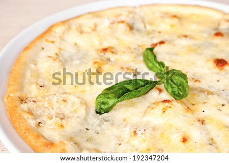 Pizza with gorgonzola, parmesan, mozzarella and pecorino cheese