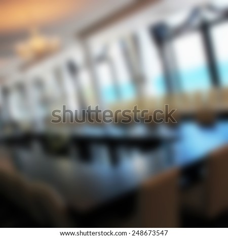 Abstract blurred image of conference hall as a background for your design
