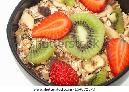 Healthy mixed muesli in bowl closeup