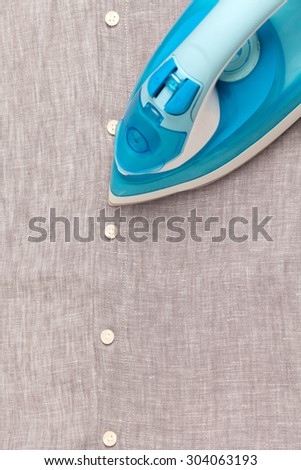 ironing housework ironed folded shirts clean concept still life garment apparel cloth indoors