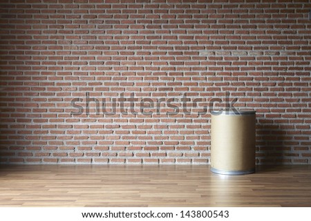 bin on wall brick