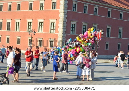 WARSAW - JUNE 13: tourists in the Old Town. Warsaw was destroyed up to the basement during World War II, rebuilt in the years 1949-1958 in Warsaw, Poland on June 13, 2015