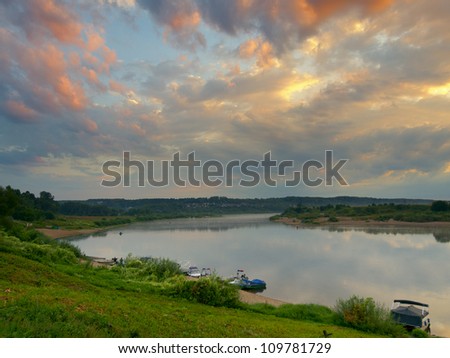Summer sunrise on a river in Russia