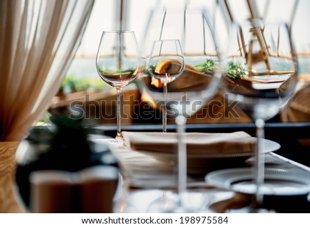 Table in restaurant served for lunch. Photo with beautiful bokeh.