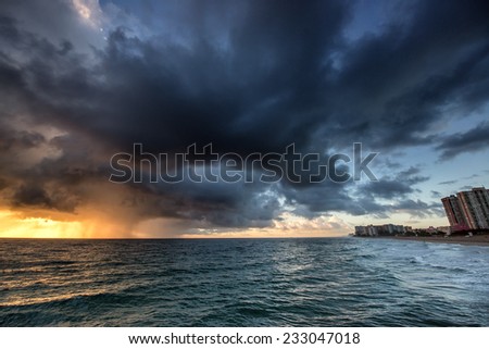 Early morning rainy landscape with rain over Miami Beach, Florida.