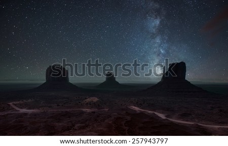 Milky Way and bright stars above Monument Valley. USA