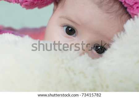 cute funny baby looking with her eyes