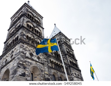 Lund cathedral with Swedish flags in front of it