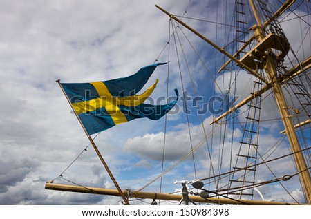 Swedish flag on the old ship\'s keel