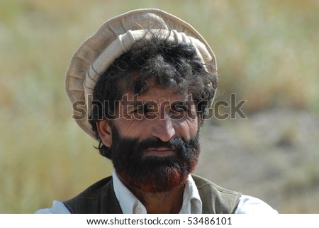 GARDEZ - AUGUST 26: Afghan tribal elder, 54, from Gardez, Paktia pays attention during a jirga August 26, 2009 in Gardez, southeast Afghanistan.
