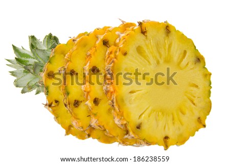delicious fresh pineapple cut in pieces isolated on the white background