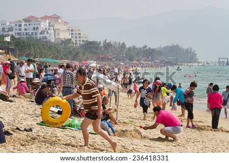 Sanya, China - January 21, 2014: The view of Yalong Bay, there are many people in there, most of them come here for the warm weather and beautiful scenery, but it's too crowded