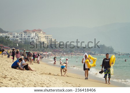 Sanya, China - January 21, 2014: The view of Yalong Bay, there are many people in there, most of them come here for the warm weather and beautiful scenery, but it\'s too crowded