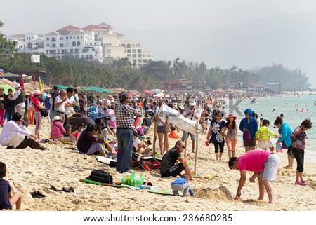 Sanya, China - January 21, 2014: The view of Yalong Bay, there are many people in there, most of them come here for the warm weather and beautiful scenery, but it's too crowded