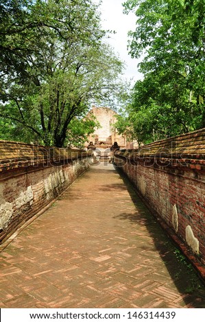 Narrow path through the ancient  walls