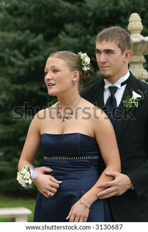 Beautiful, happy young couple in formal attire