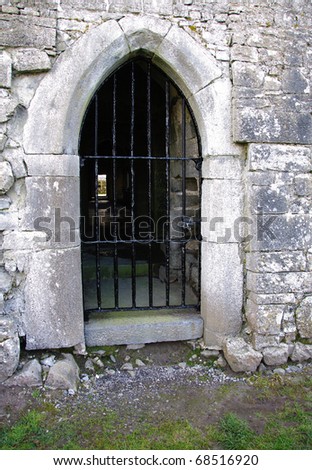 metal bar gated stone door