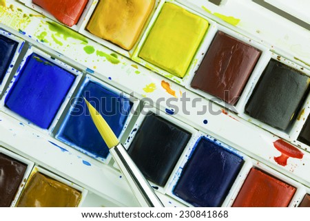 Artists watercolour paints and sable hair paint brush background hobbies and leisure time