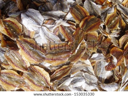 cut and dried smoked fish piled up at an Asian market