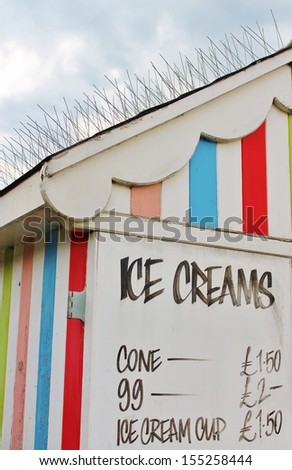 Victorian striped \'Beach hut\' seaside style ice cream hut